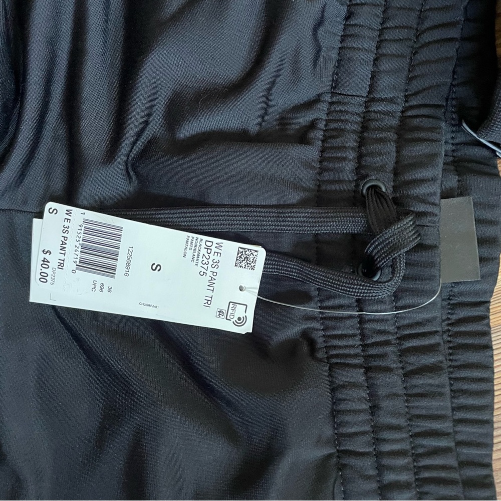 ADIDAS track suit the jacket is a medium. The pants are size small